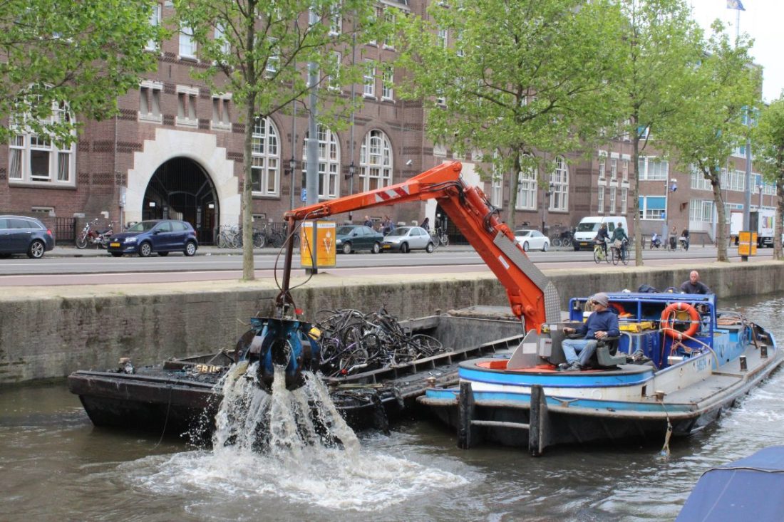 canal-cleaning-boat-bikes-e1508935452260